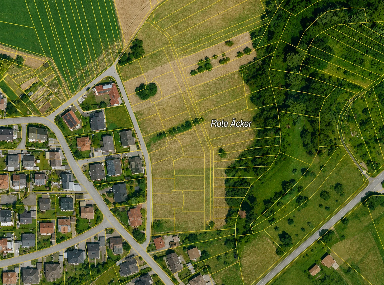 Luftbildkarte des Neubaugebiets Rote Äcker mit sichtbaren Grundstücksgrenzen.